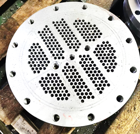 Placa en forma de tubo con un gran número de agujeros